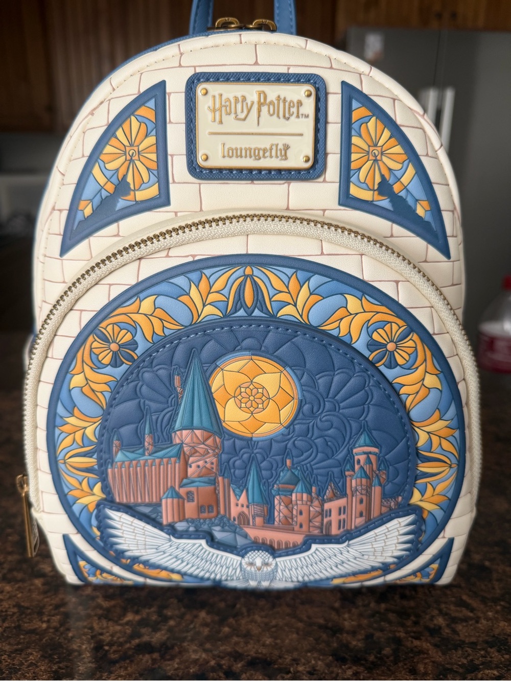 Loungefly Blue, Cream & Yellow Hogwarts Mini Backpack